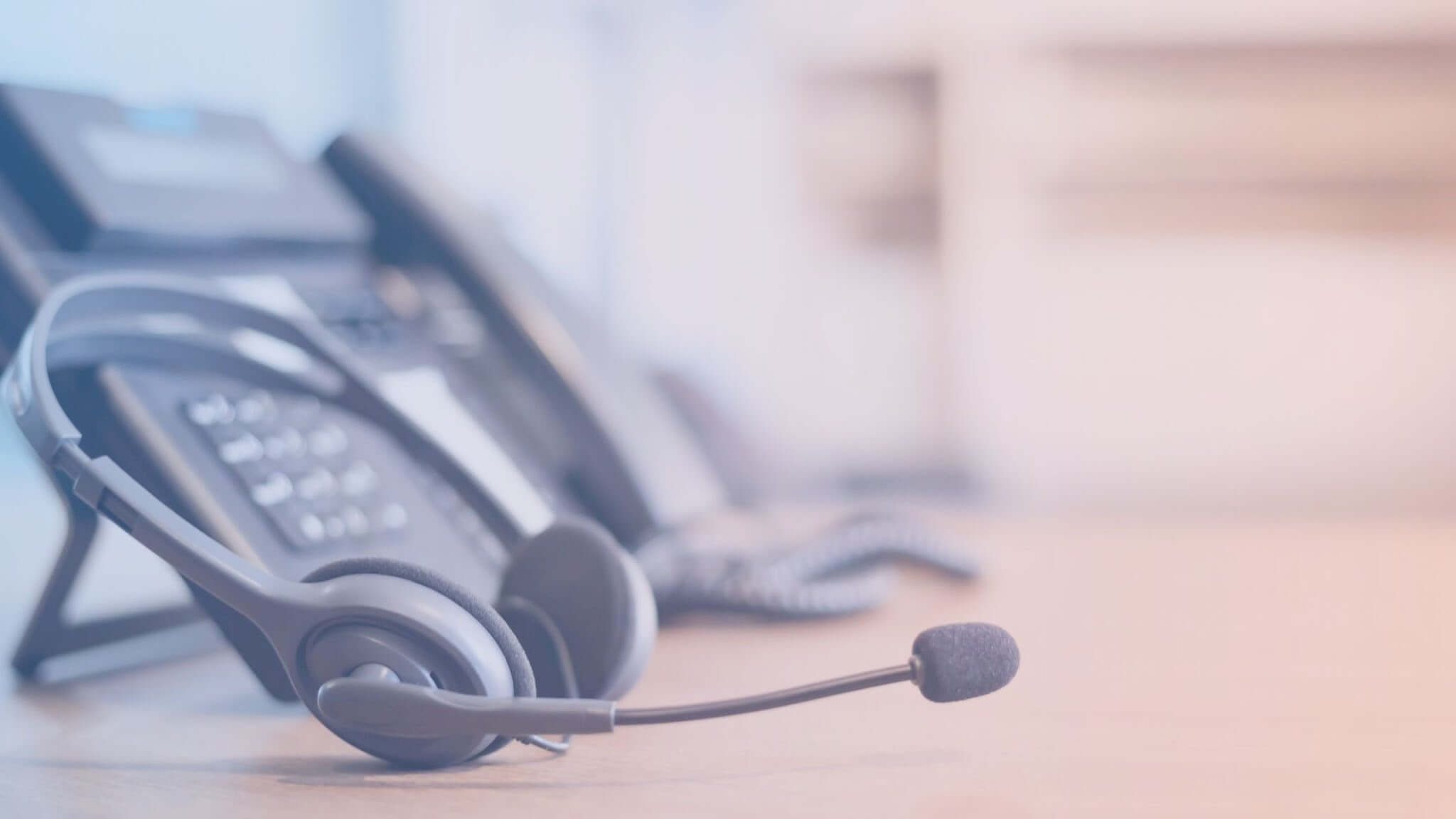 Office headset and desk phones used for traditional call answering